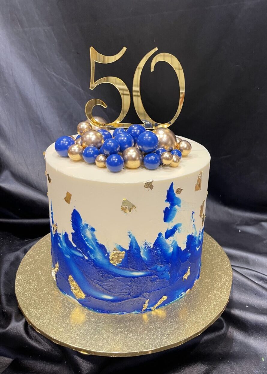 Blue Smear with Foam Spheres, Gold Leaf and Topper
